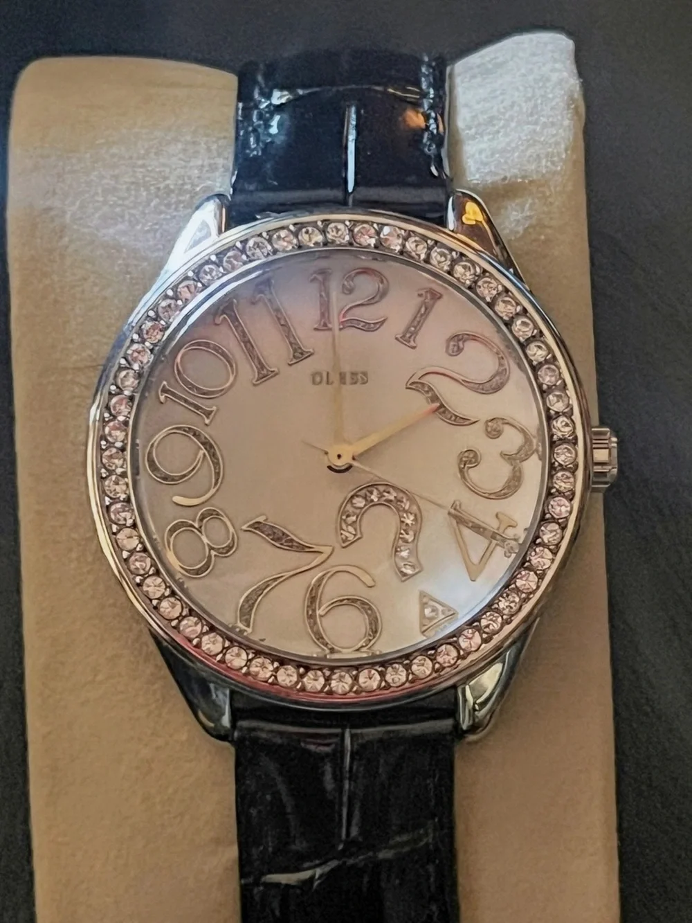 Guess Women's Silver Crystal Bezel Watch with Black Strap
